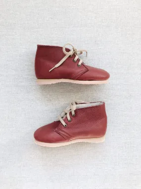 lace-up leather boots in burgundy leather